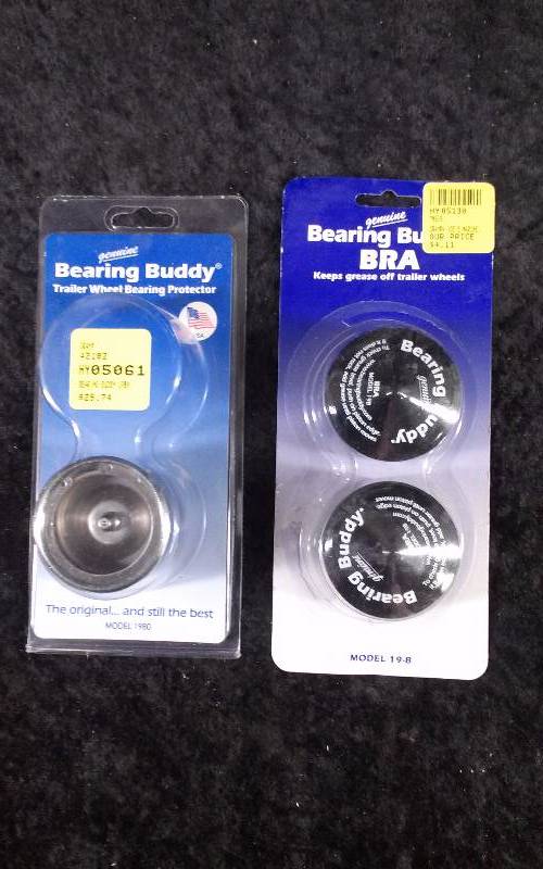lot 173 image: Lot - Bearing Buddy Trailer Wheel Bearing Protector & Bearing Buddy Bra