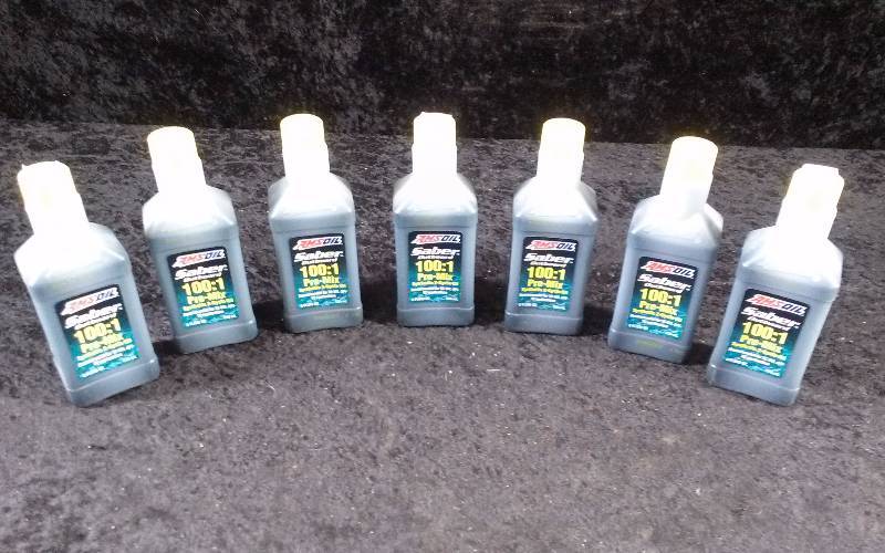 lot 581 image: OIL - (7) AMSOIL Saber Outboard, 2-Cycle, 1001 Premix, 8ozeach