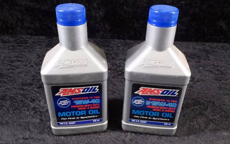 lot 588 image: OIL - (2) AMSOIL Premium Heavy Duty Diesel & Marine Motor Oil, 15W-40, 1qteach