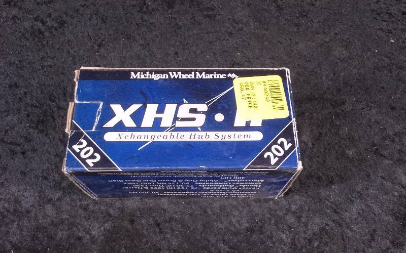 lot 909 image: Hub System - Michigan Wheel XHS Xchangeable Hub System, 202