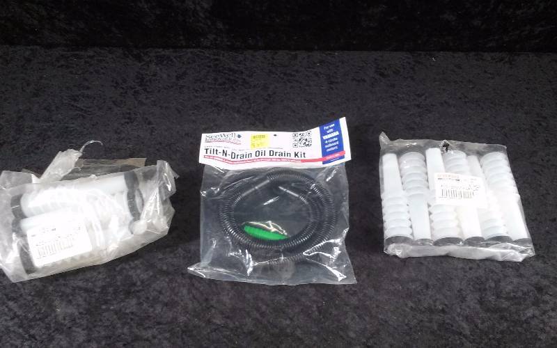 lot 921 image: Lot - Yamaha Spouts (2) and (1) Seawell Innovations Tilt N Drain Oil Drain Kit