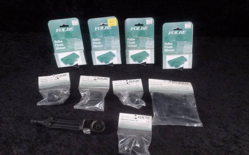 lot 1115 image: Lot - Misc Folbe (4) Flush Mount (4) Angle Adjust Disc (1) Rod Holder Cleat, (1) Rod Holder Ext
