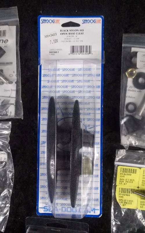 lot 1133 image: Lot - Misc, Cleat, Plug Holders, Rope Thimble, Etc