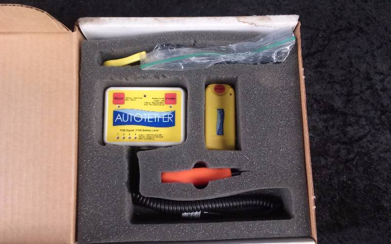 lot 1186 image: AutoTether (Wireless Kill Switch & Alarm for Falling Overboard)