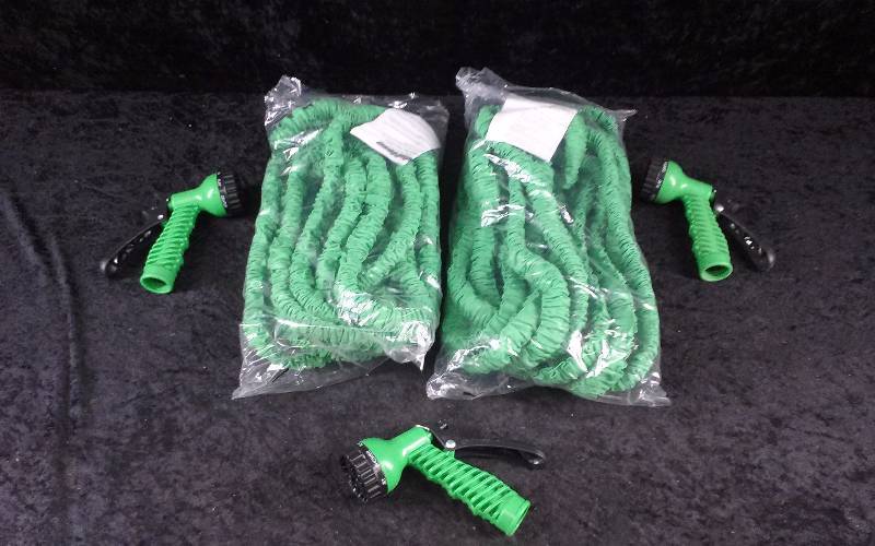 lot 1332 image: Lot - Expandable Garden Hoses & Sprayers