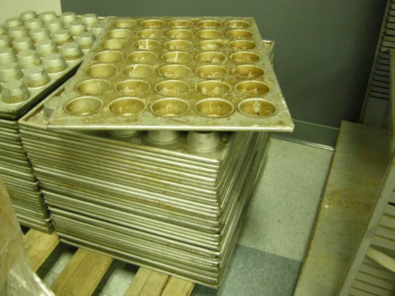 lot 89 image: Group Steel Cupcake Trays