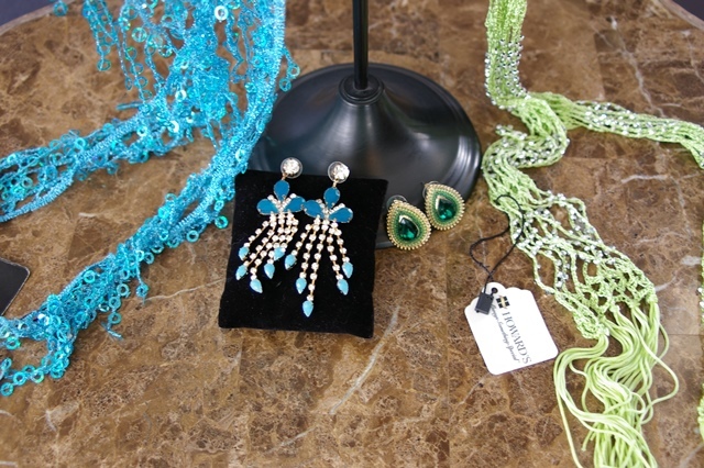 lot 42 image: Two Howards Scarves, Cell Phone Wristlet and Two pairs of Earrings