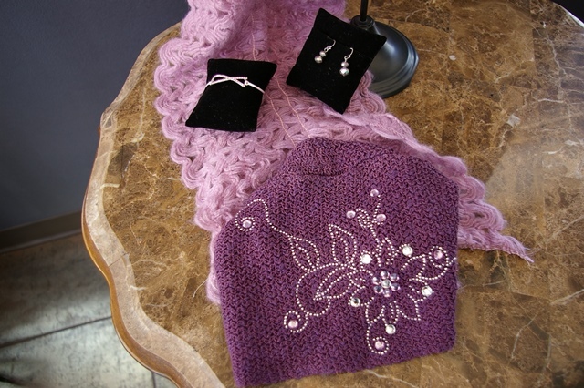lot 62 image: Scarf, Hat, Bracelet and Earrings