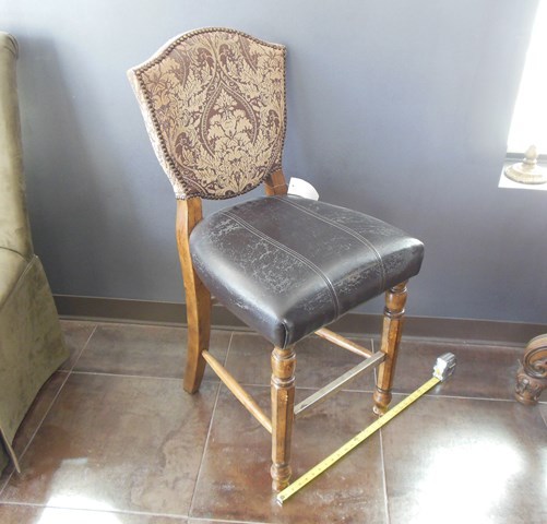 lot 14 image: Ashley Furniture Chair with Leather Seat, Upholstered Back and Metal Wrapped Foot Rest (Ashley Furniture)