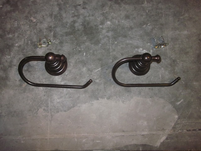 lot 119 image: Two Bronze Finish Bath Tissue Holders