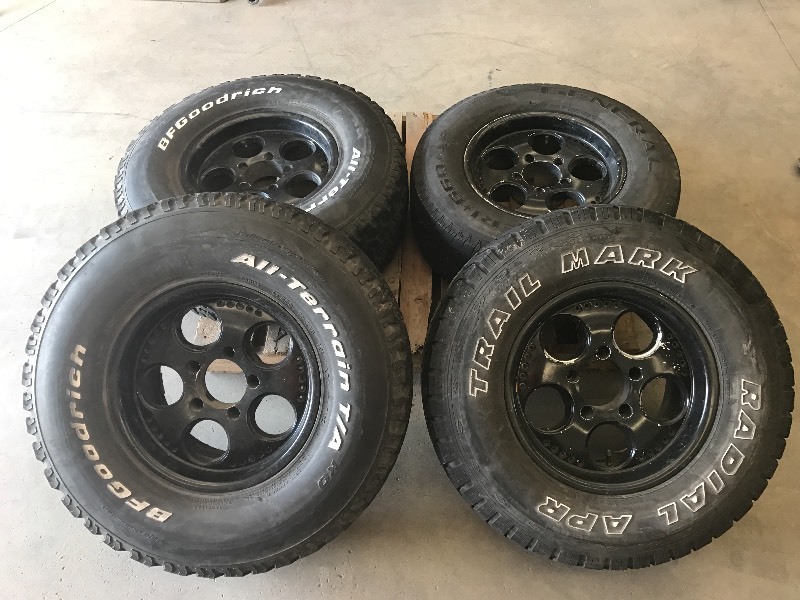 lot 61 image: (4) Wheels & Tires 5-Lug 16 Wheel...