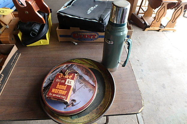 lot 556 image: Thermos, Tin, Giant Hand Warmer
