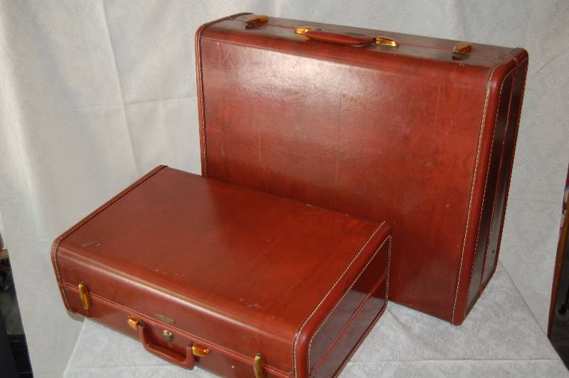 Two Hard Sided Suit Cases
