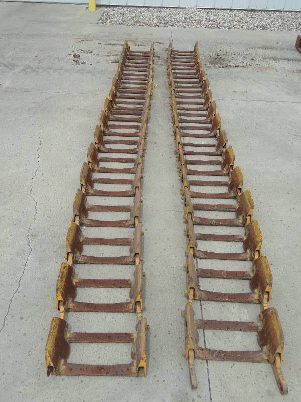 lot 1 image: Grouser Bar Tracks for Skid Loader
