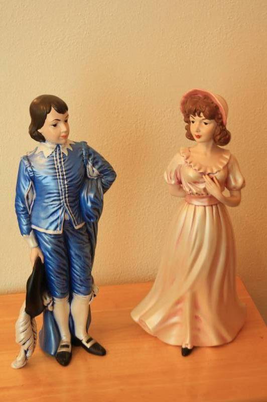 lot 139 image: BLUE BOY AND PINK GIRL STATUES
