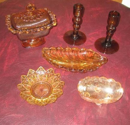 lot 159 image: COLORED GLASS DISHES AND CANDLE HOLDERS