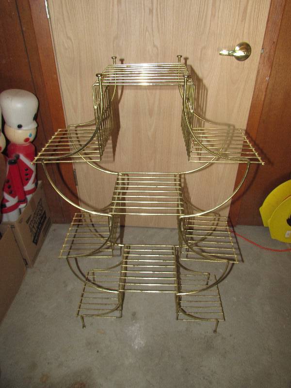 lot 5 image: GOLD COLOR WIRED SHELF OR PLANT STAND