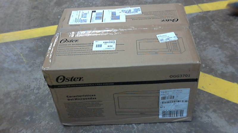 lot 2951 image: Oster .7Cu 700W Microwave Oven