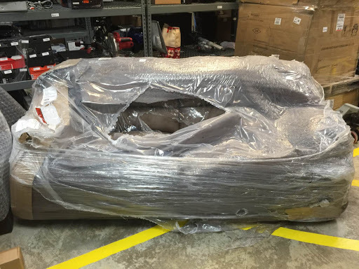 lot 2809 image: Ashley Furniture Hogan 2-Seat Reclining Sofa Couch Brown DAMAGED