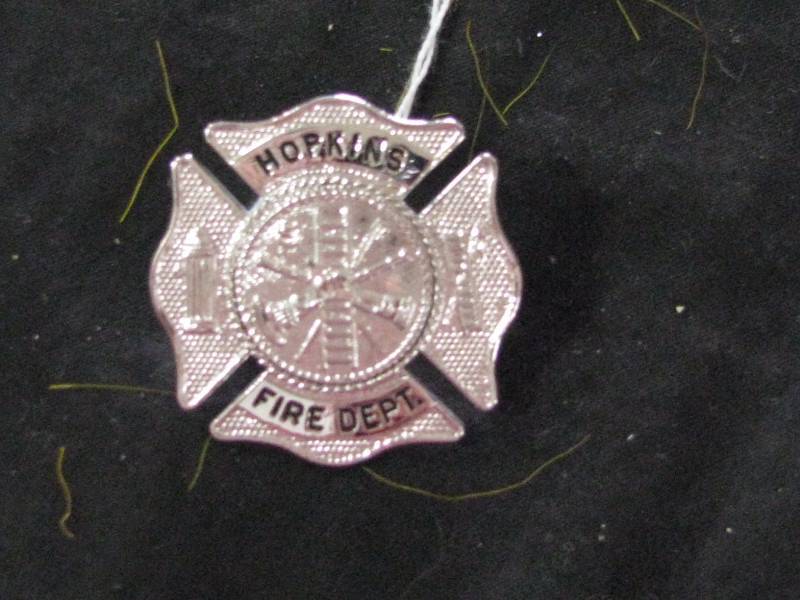 lot 24 image: Hopkins, Mn. Fire Dept badge (Obsolete)