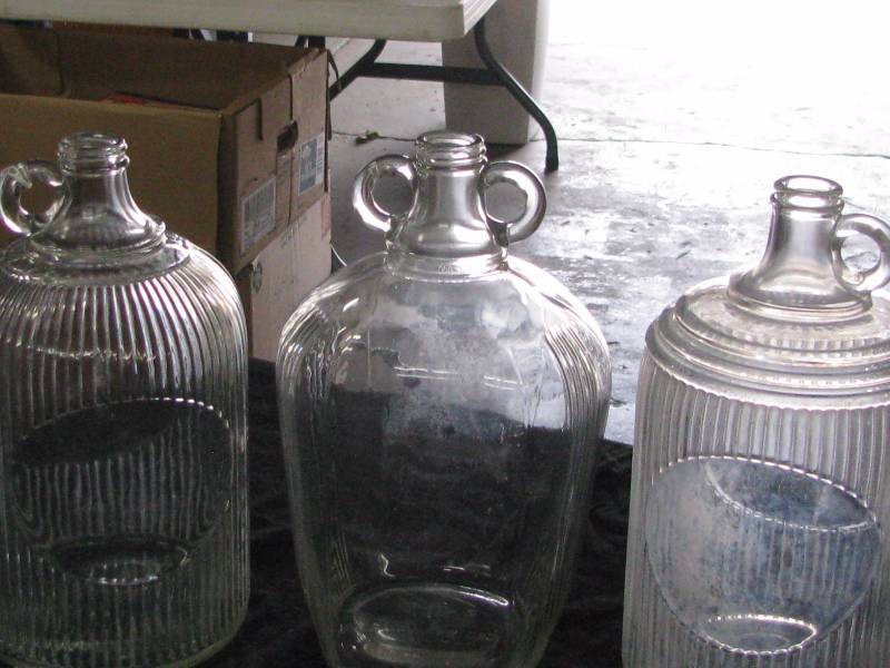 lot 28 image: Glass 1 gallon Jugs