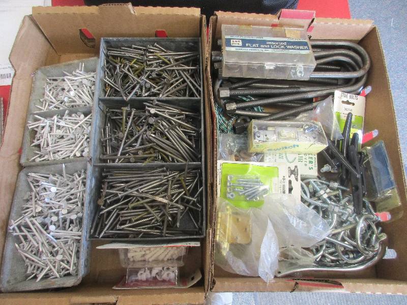 2 boxes of nails - screws - u bolts - and misc hardware