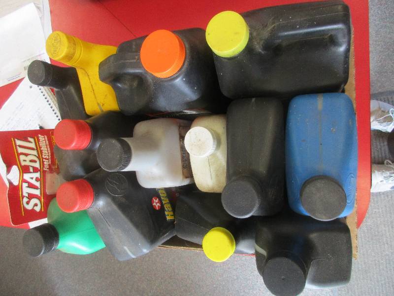 13 quarts of various unopened oil