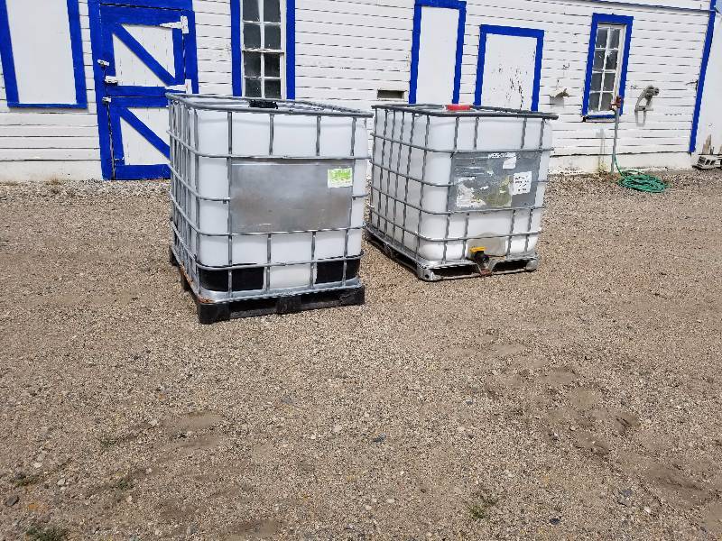lot 15 image: 2 Emtpy 250 Gal Shuttles