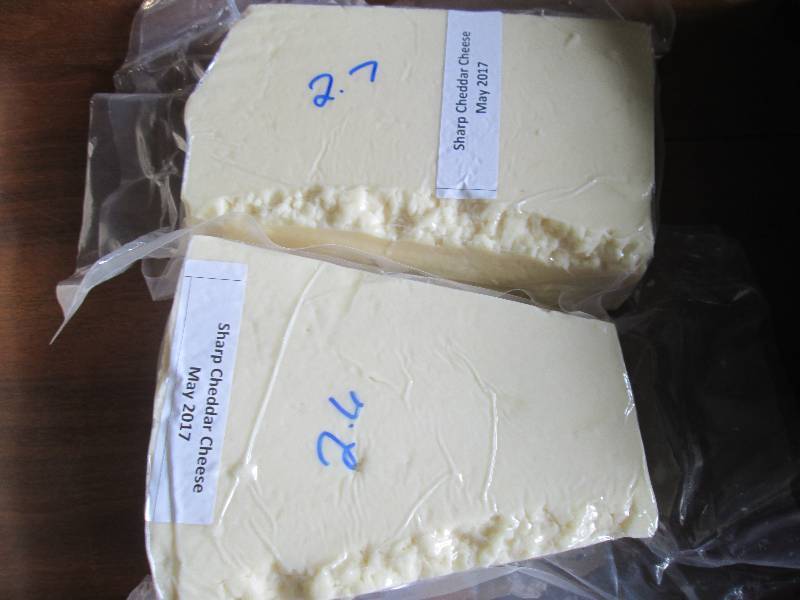 lot 9 image: 5.3 lb.Chunk Sharp Cheddar Cheese P...