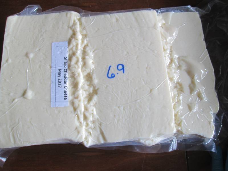 lot 10 image: 6.9 lb.Chunk Sharp Cheddar Cheese P...