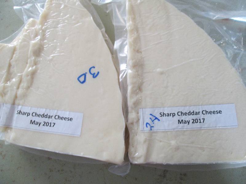 lot 13 image: 5.4 lb.Chunk Sharp Cheddar Cheese P...