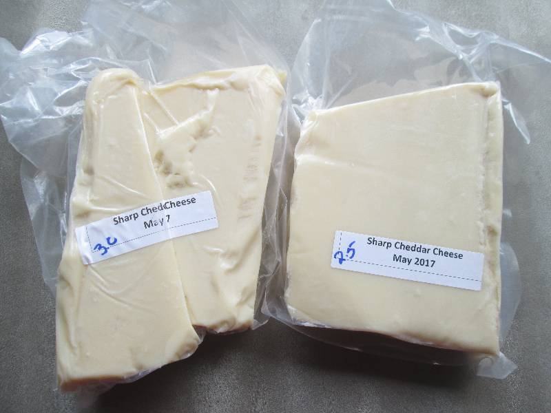 lot 28 image: 5.5 lb.Chunk Sharp Cheddar Cheese P...