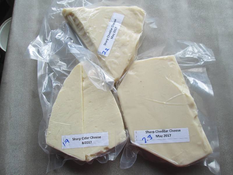 lot 29 image: 6.4 lb.Chunk Sharp Cheddar Cheese P...