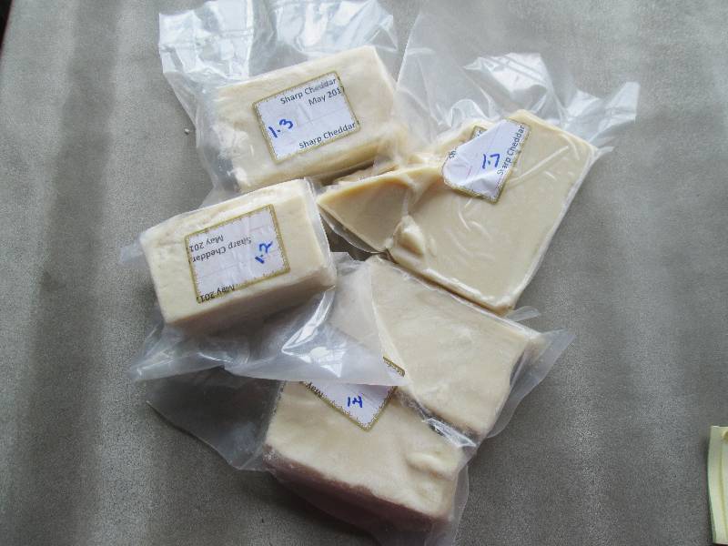 lot 32 image: 5.6 lb.Chunk Sharp Cheddar Cheese P...