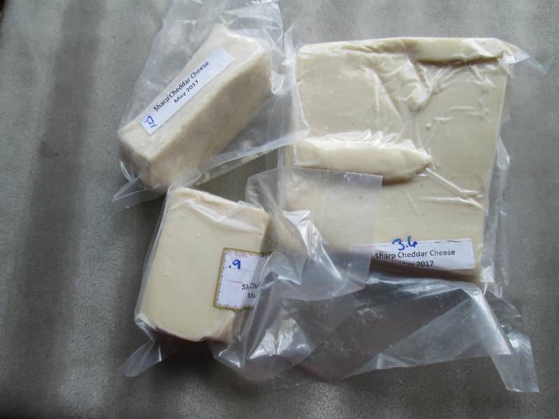 lot 38 image: 5.5 lb.Chunk Sharp Cheddar Cheese P...
