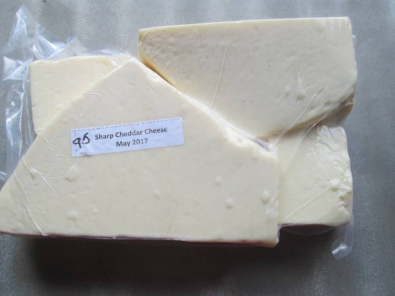 lot 39 image: 9.5 lb.Chunk Sharp Cheddar Cheese P...