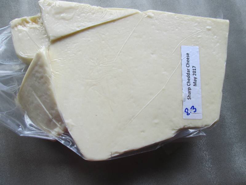 lot 40 image: 8.3 lb.Chunk Sharp Cheddar Cheese P...