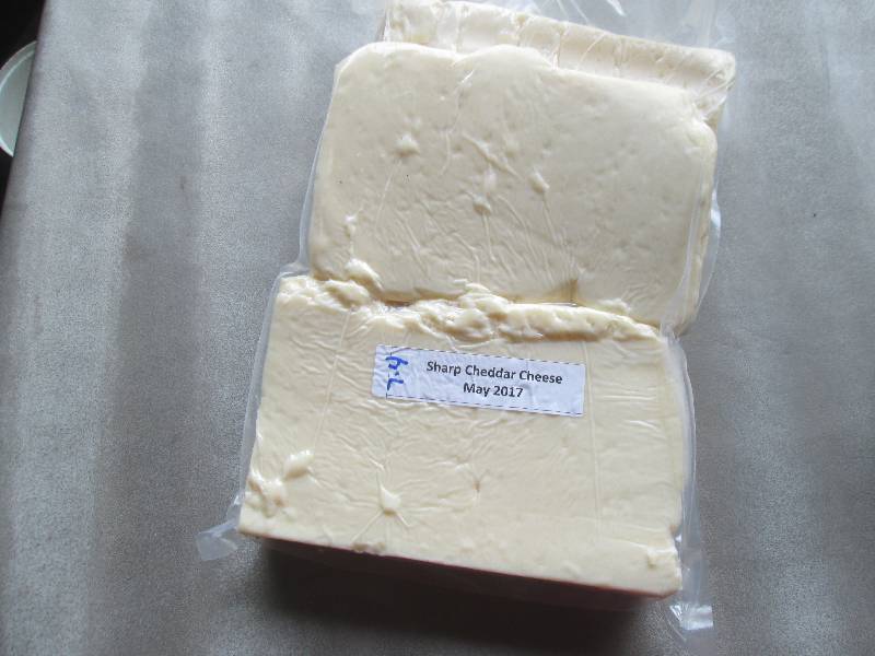 lot 42 image: 7.4 lb.Chunk Sharp Cheddar Cheese P...