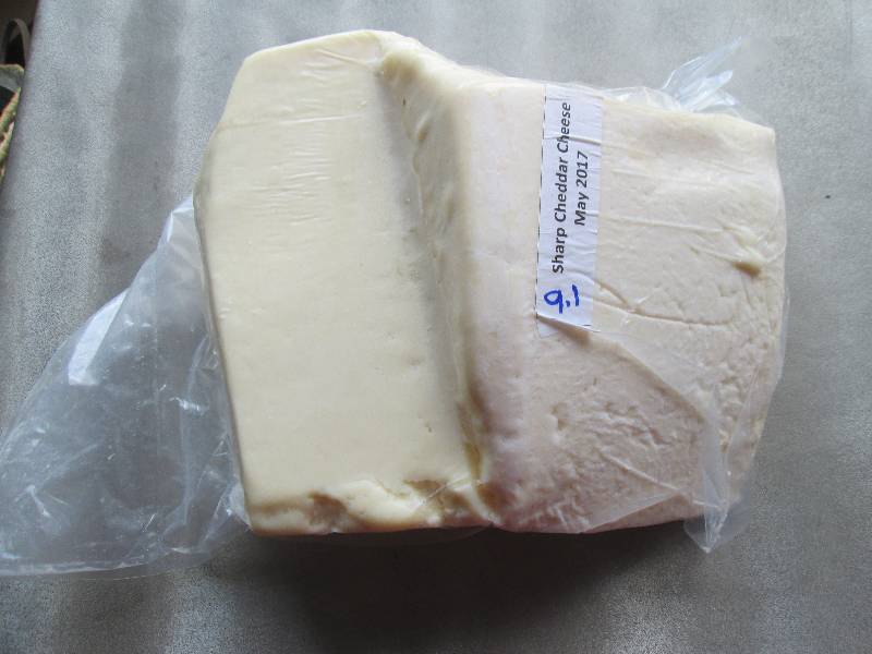 lot 43 image: 9.1lb.Chunk Sharp Cheddar Cheese Pr...