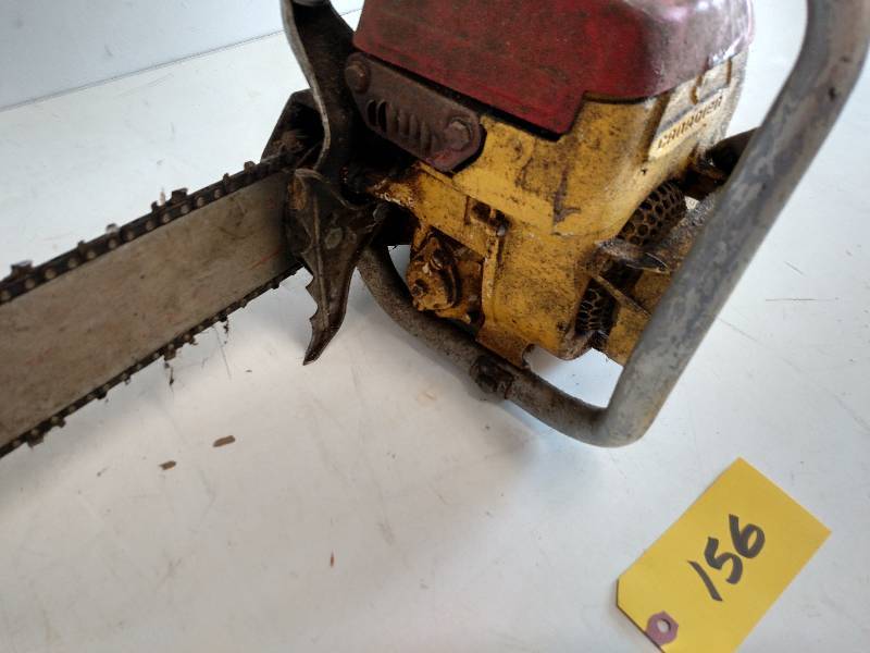lot 156 image: Vintage Canadien Chain Saw, Has Com...