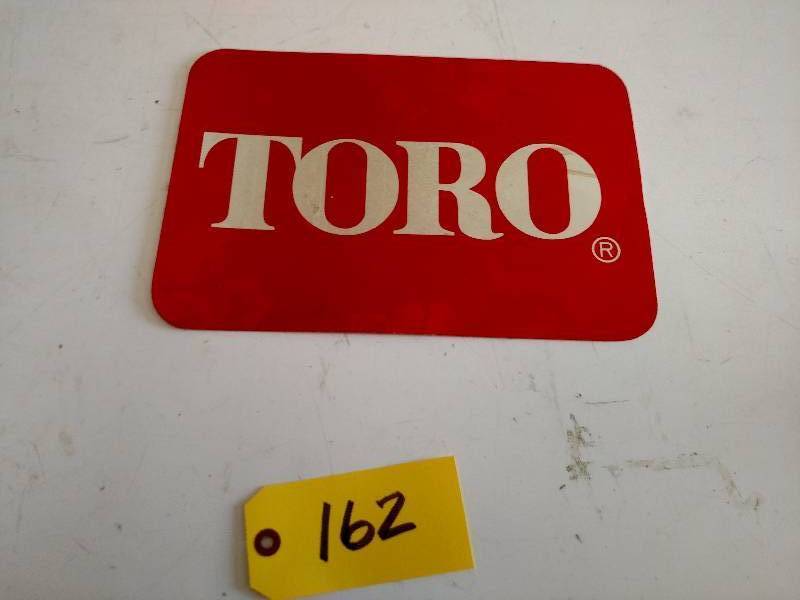 lot 162 image: Toro Poly Sign, 2-Sided, 13x9...