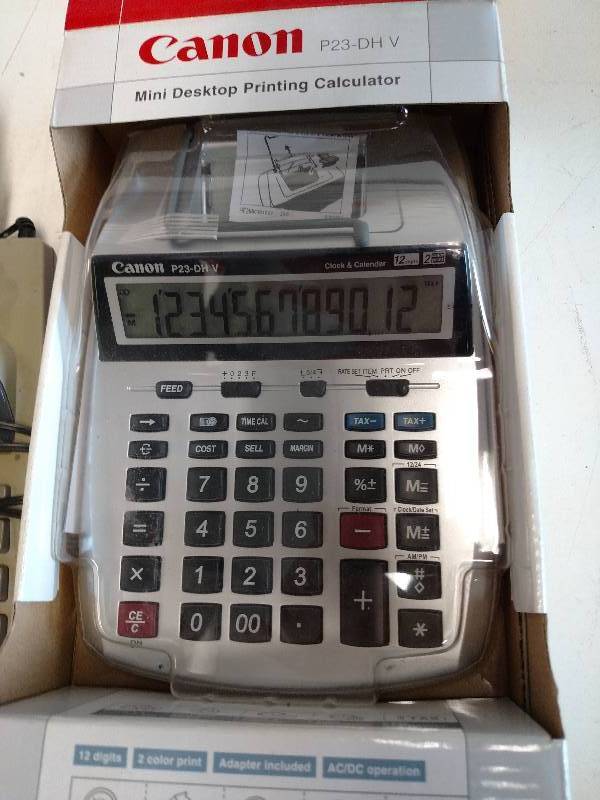 lot 230 image: (2) Calculators...