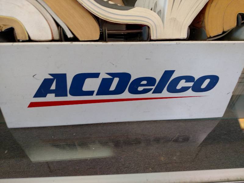 lot 352 image: AC Delco Catalog Rack with Catalogs...