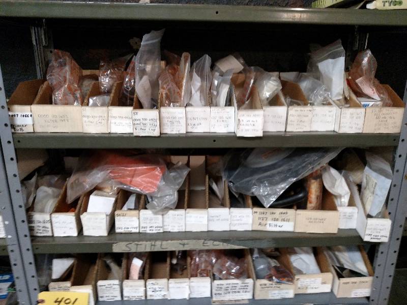 lot 401 image: Stihl Parts on (4) Shelves ...