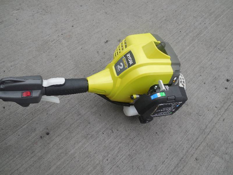lot 20 image: Ryobi 25 cc 2-Cycle Full Crank Curved Shaft Gas String Trimmer