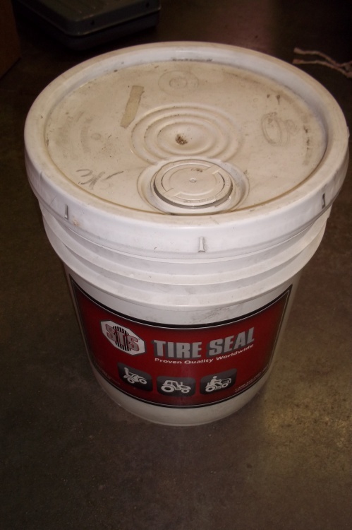 lot 35 image: 5 Gallons Tire Seal