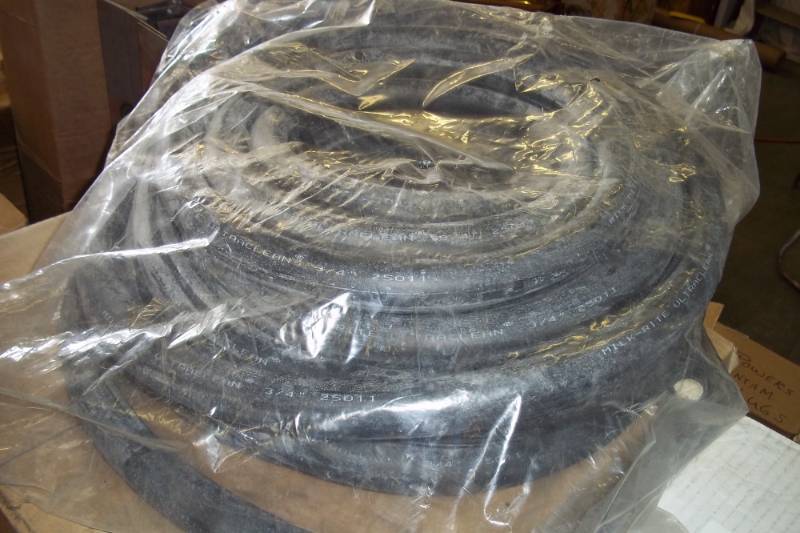 lot 49 image: Roll of Black Milk-Rite Ultra Clean 34 Milk Hose