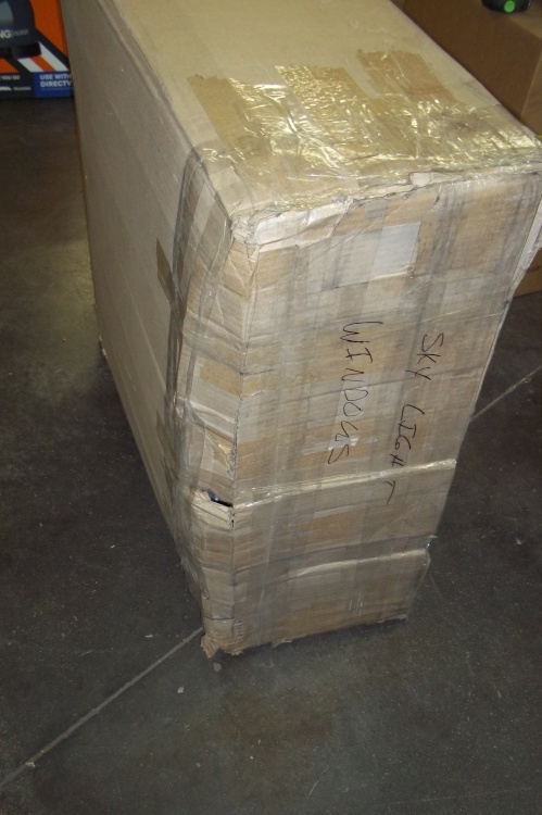 lot 138 image: 31 x 32 x 12 Box of Sky Light Windows