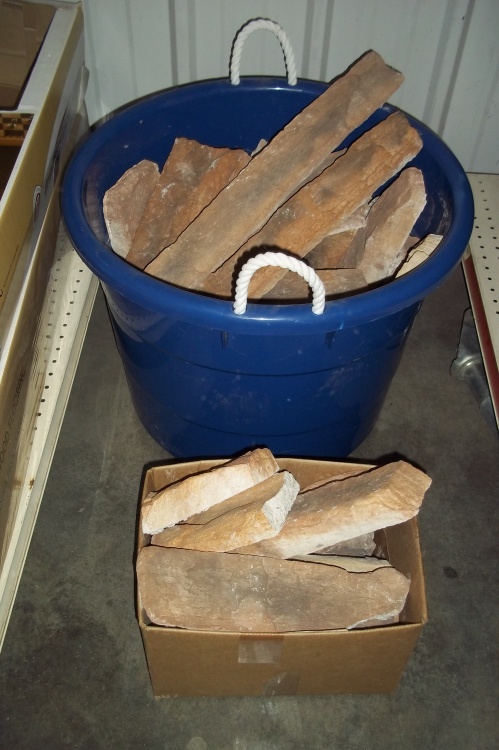 lot 198 image: Decorative Brick Pieces with Blue Tub