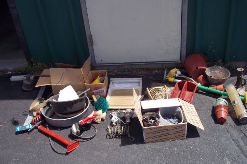 lot 204 image: Vintage Washboard, Nails, Plastic Potting Containers, Bike Tire Pump, Sprinkler, Metal Ruler, Assorted Pans, Weed Eater String